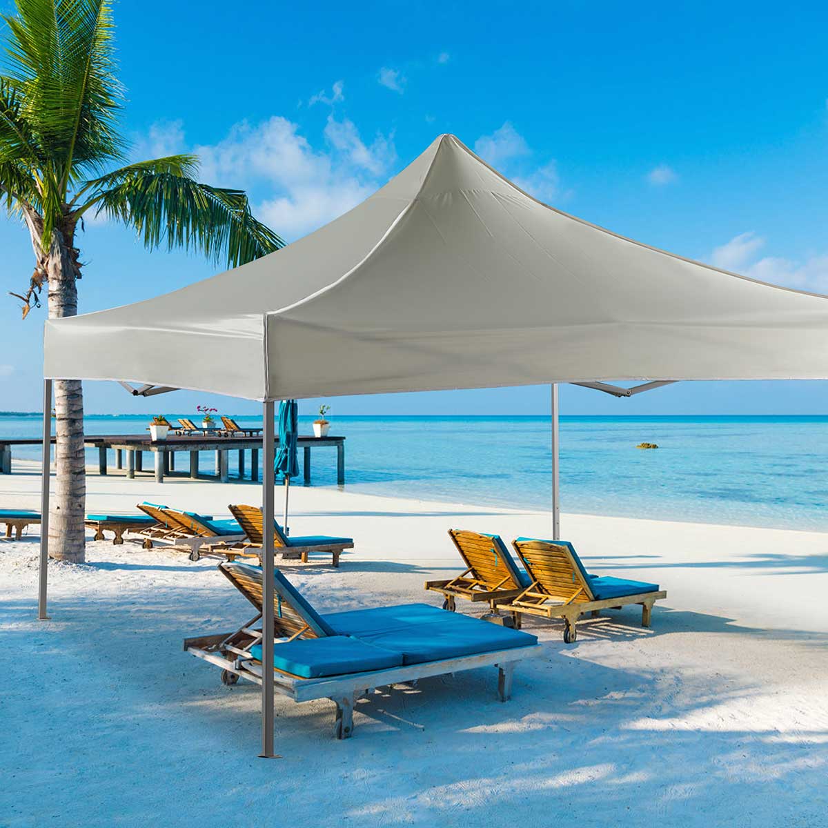 Carpa gazebo Terracota plegable 3x3 m crema ambientada en playa