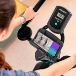 Bicicleta estática Cecotec DrumFit Indoor 23000 Kosmos Pro UltraFlex pantalla LCD negro detalle porta dispositivos