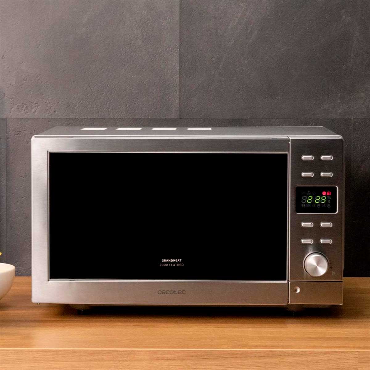 Microondas Cecotec GrandHeat 2000 Flatbed Steel 20L 700W tecnología sin plato gris ambientada