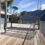 Banco columpio Outsunny con reposabrazos negro 52x127x59,5 cm