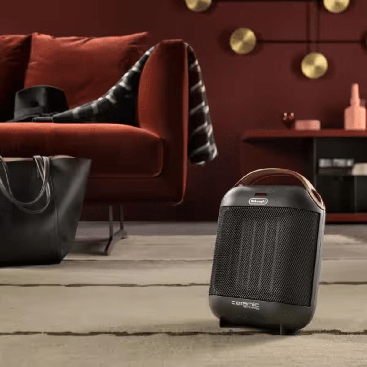 Calefactor cerámico De’Longhi HFX30C18.AG 1800W autorregulable negro ambientada