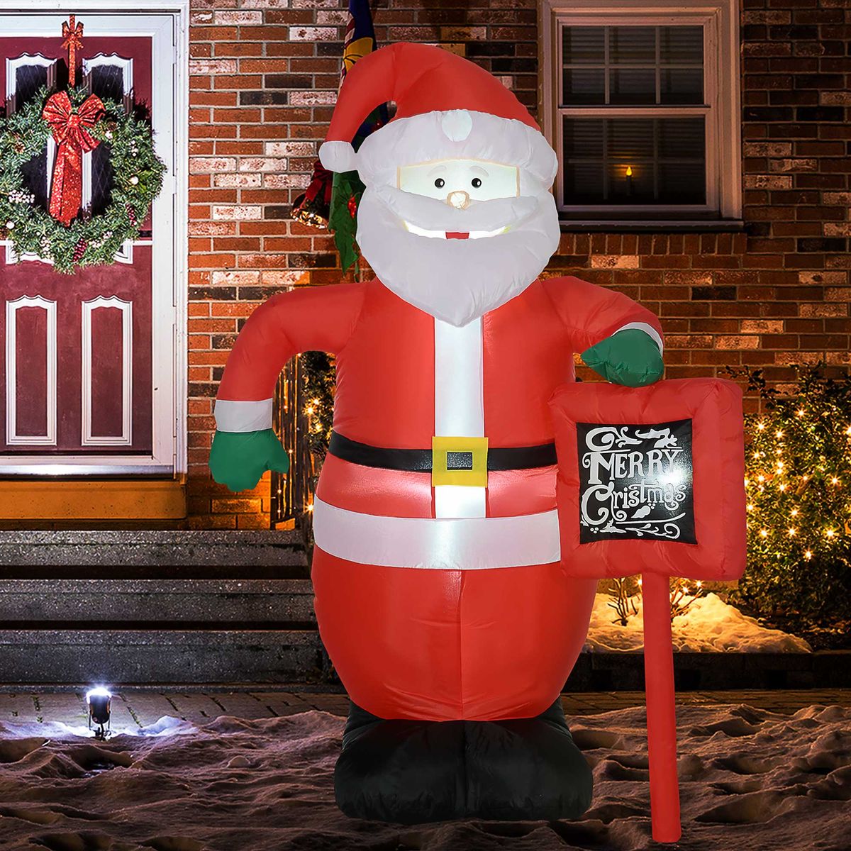 Papá Noel hinchable Homcom con 3 luces LED + inflador eléctrico multicolor 180x120x65 cm animada