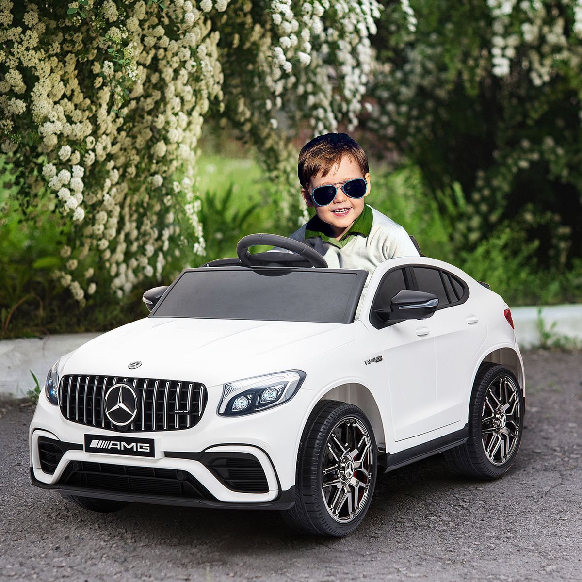 Cochecito eléctrico Mercedes AMG Homcom con mando +3A blanco 55x115x70 cm animada