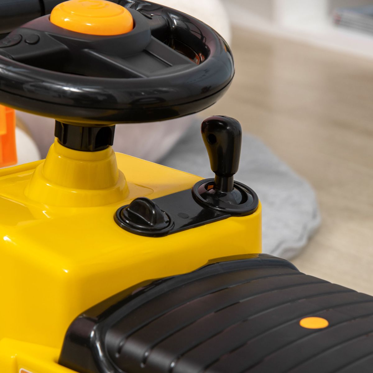 Tractor correpasillos Tuko Homcom con brazo móvil + 3A amarillo 47,5x86x27,5 cm detalle
