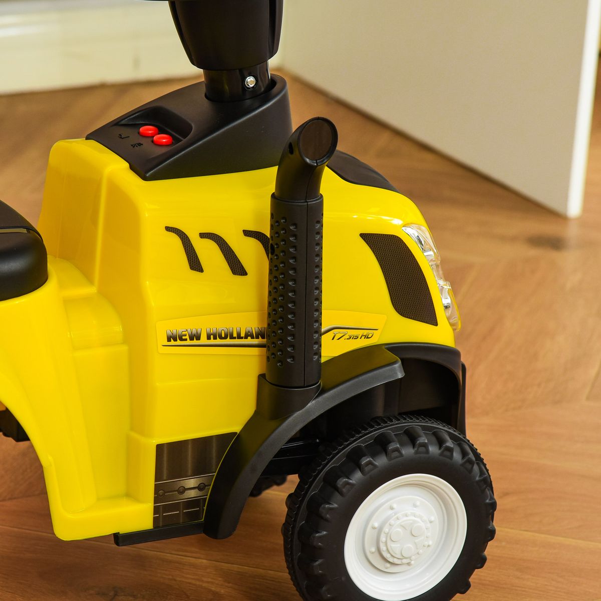 Tractor infantil Homcom con remolque desmontable 1-3 años amarillo 44x91x29 cm detalle