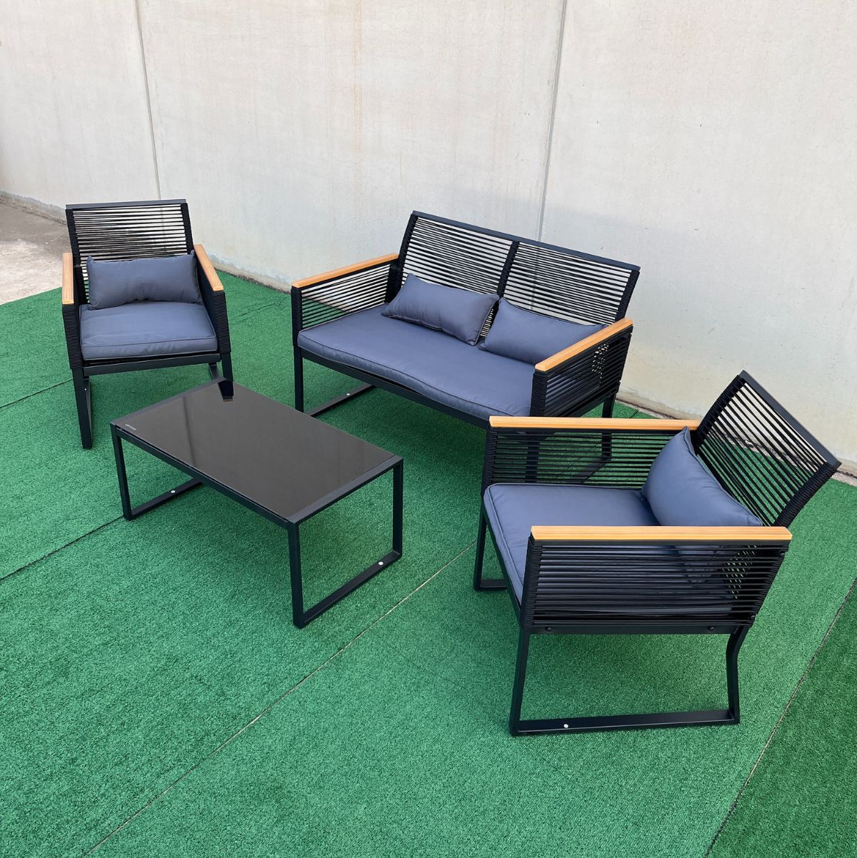 Conjunto-de-exterior-Eleganza-sofa---sillones---mesa-y-cojines-negro-roble