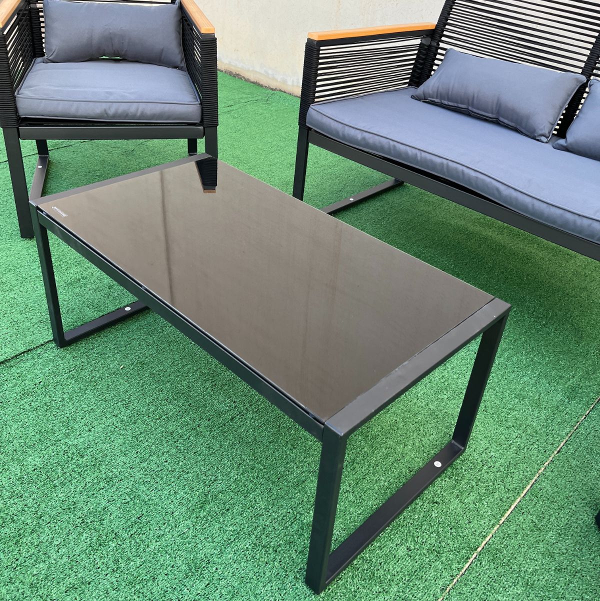 Conjunto-de-exterior-Eleganza-sofa---sillones---mesa-y-cojines-negro-roble