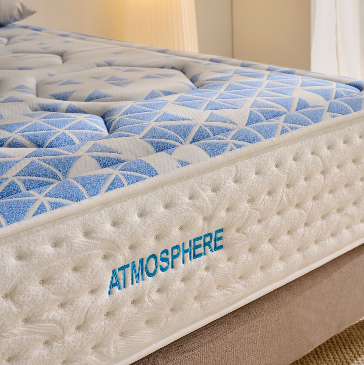 Colchon-viscoelastico-Atmosphere-nucleo-muelles-ensacados-blanco-azul-30-cm-detalle