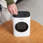 Calefactor-ceramico-Taurus-Tropicano-7CR-1500W-oscilante-20-m²-blanco-ambientada